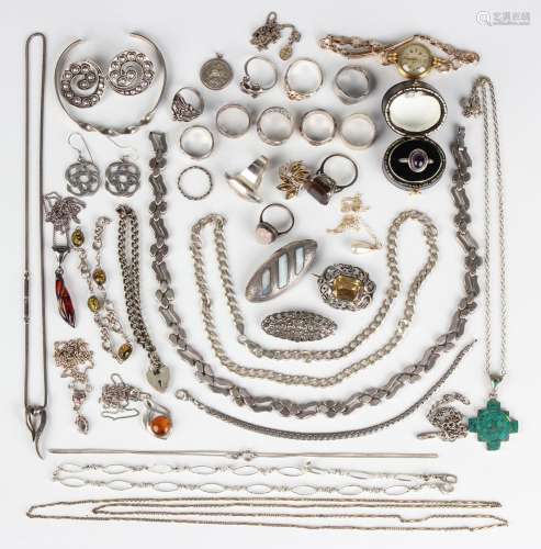 A small group of silver and other jewellery, including a sil...