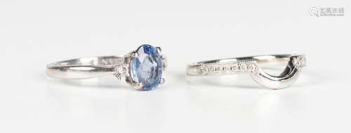 An 18ct white gold, sapphire and diamond three stone ring, c...