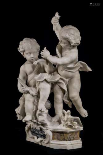A CARVED WHITE ALABASTER FIGURAL GROUP OF TWO PUTTI 18TH/19T...