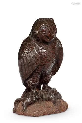 A CARVED WOOD FIGURE OF AN OWL, POSSIBLY SWISS, EARLY 20TH C...