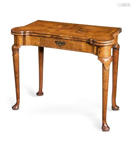 A GEORGE I WALNUT AND FEATHER BANDED CARD TABLE, CIRCA 1720