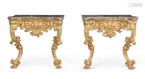 A PAIR OF ITALIAN CARVED GILTWOOD CONSOLE TABLES, MID 18TH C...