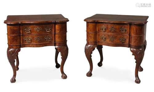 A PAIR OF NORTH EUROPEAN WALNUT SERPENTINE FRONTED SIDE TABL...