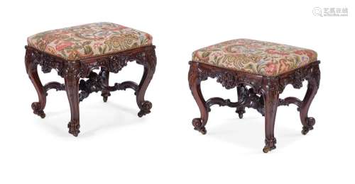 A PAIR OF CARVED MAHOGANY STOOLS IN GEORGE II STYLE, LATE 19...