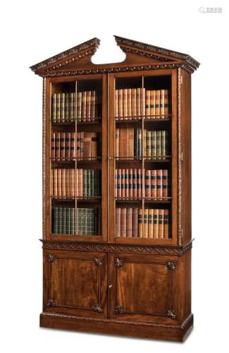 A GEORGE II MAHOGANY BOOKCASE, IN THE MANNER OF THOMAS CHIPP...