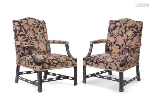 A PAIR OF CARVED BEECH AND NEEDLEWORK UPHOLSTERED GAINSBOROU...