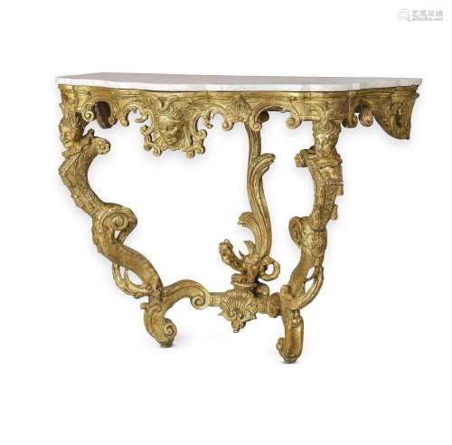 AN ITALIAN CARVED GILTWOOD SERPENTINE CONSOLE TABLE, 18TH CE...