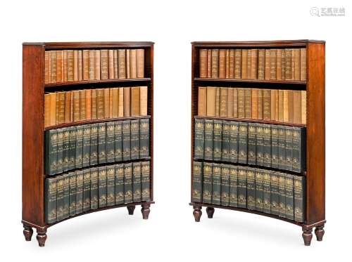 AN UNUSUAL PAIR GEORGE III MAHOGANY CONCAVE OPEN BOOKCASES, ...