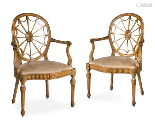 A PAIR OF CARVED BEECH OPEN ARMCHAIRS, IN THE MANNER OF GEOR...