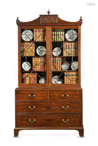 A GEORGE III MAHOGHANY BOOKCASE, IN THE MANNER OF JOHN LINNE...