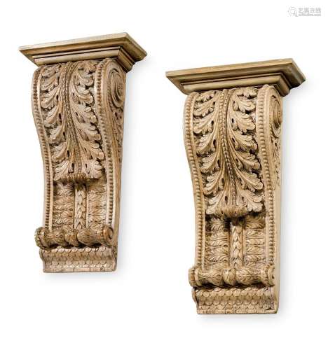 A PAIR OF CARVED PINE WALL BRACKETS, IN GEORGE II STYLE, EAR...
