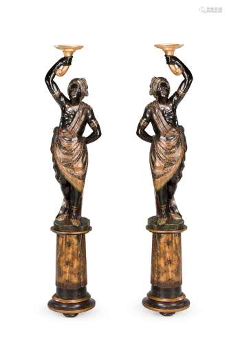 A PAIR OF CARVED AND POLYCHROME DECORATED 'BLACKAMOOR' FIGUR...