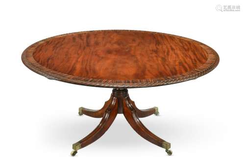 Y A REGENCY MAHOGANY AND ZEBRAWOOD CROSSBANDED CENTRE TABLE,...
