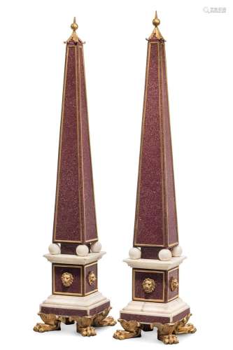 A PAIR OF ORMOLU MOUNTED RED PORPHYRY AND WHITE MARBLE OBELI...