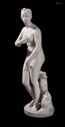 AFTER THE ANTIQUE, A CARVED WHITE MARBLE FIGURE OF THE MEDIC...