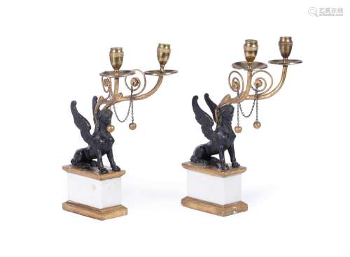 A PAIR OF REGENCY STYLE BLACK SPELTER AND MARBLE CANDELABRA,...