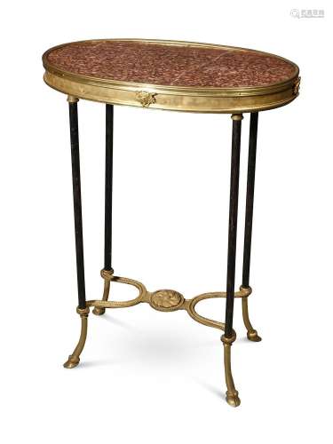 A FRENCH GILT METAL AND MARBLE TOPPED GUERIDON TABLE, LATE 1...
