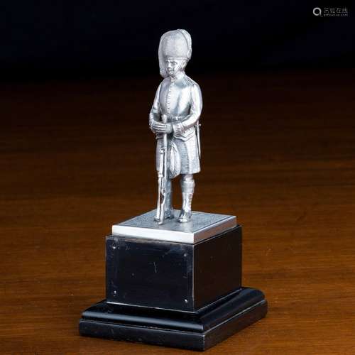 A GEORGE VI SILVER FIGURE OF A SCOTTISH BLACK WATCH INFANTRY...