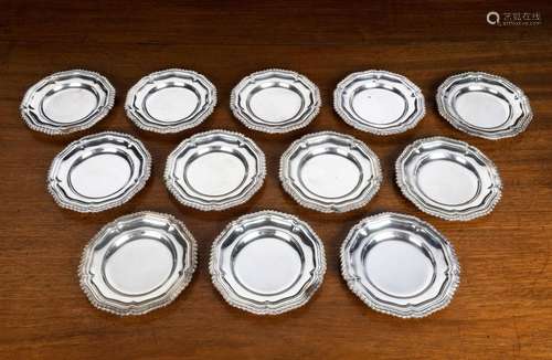 A SET OF TEN SILVER DISHES AND TWELVE STANDS, NAT LESLIE LTD...