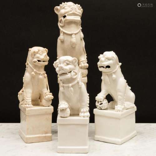 Group of Four Blanc de Chine Porcelain Buddhistic Lion Joss ...