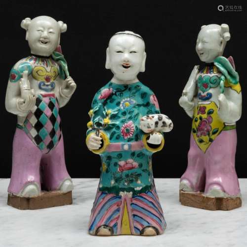 Group of Three Chinese Famille Rose Porcelain Figures of Boy...