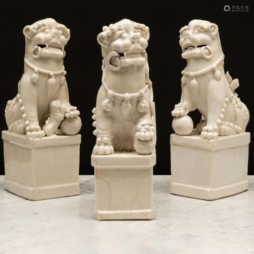 Group of Three Blanc de Chine Porcelain Buddhistic Lion Joss...