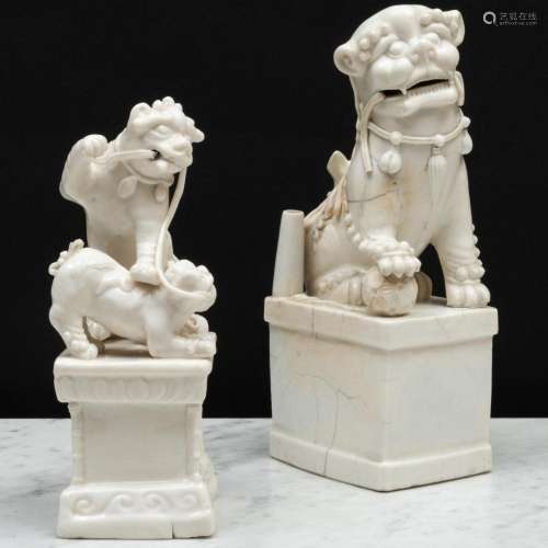 Blanc de Chine Porcelain Group of Two Playful Lions and a Bu...