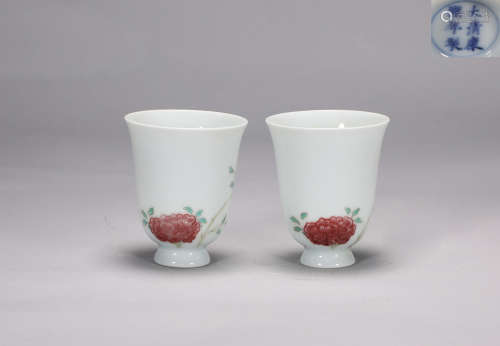 A pair of underglaze red flower cups in Kangxi of Qing Dynas...
