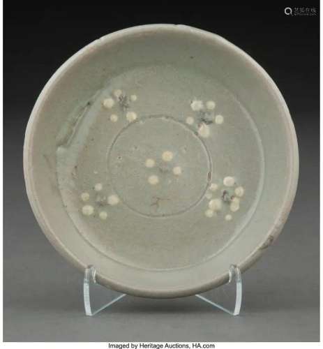 78410: A Korean Celadon Glazed Dish with Five Flower De