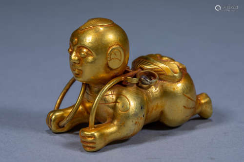 Ancient Chinese silver gilt boy holding lotus