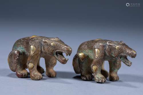 A pair of ancient Chinese gold and silver bears