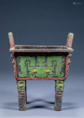 Four-legged bronze tripod with taotie pattern in ancient Chi...
