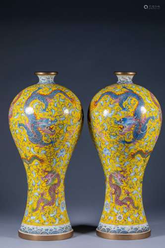 A pair of enamel-colored Kowloon plum vases made by Emperor ...