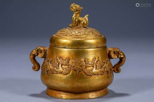 Ancient Chinese gilt jar with elephant ears and lion top and...