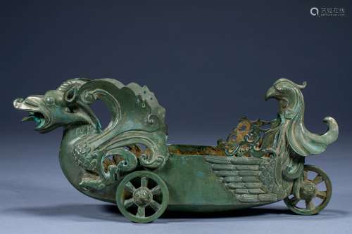 Ancient Chinese bronze dragon and phoenix boat