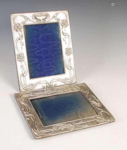A pair of Edwardian silver Art Nouveau photograph frames, Bi...