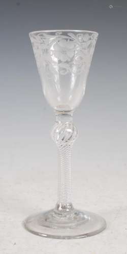 An 18th century air twist wine glass, the tapered bowl with ...