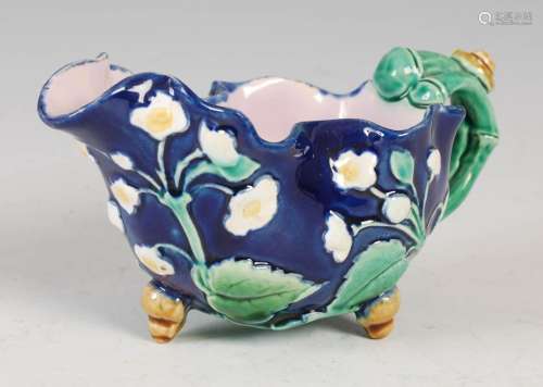 Minton Majolica cream jug/ sauce boat, decorated in relief w...