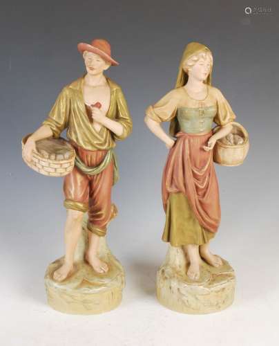 A pair of Royal Dux porcelain figures, modelled as a male fi...