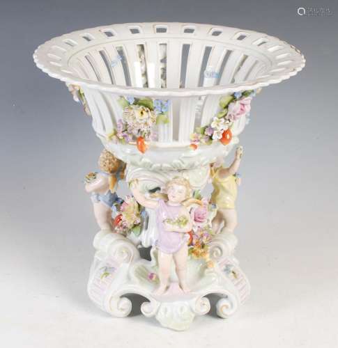 An early 20th century Dresden porcelain table centrepiece, t...