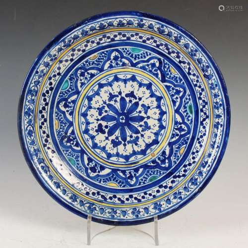 A 20th century Continental pottery bowl, decorated with styl...