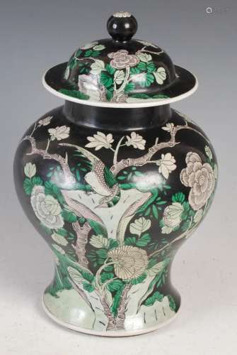 A Chinese porcelain famille verte jar and cover, Qing Dynast...