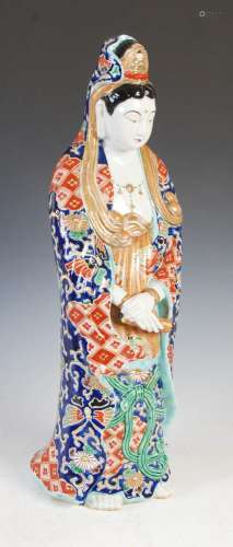 A Japanese Kutani porcelain figure of Guanyin, modelled stan...