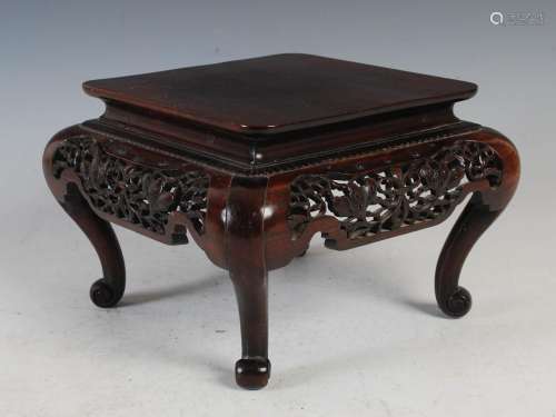 A Japanese carved and pierced wood stand, late 19th century,...