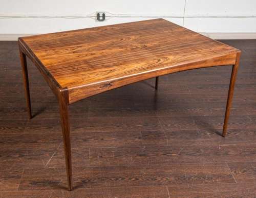 A Modus rectangular rosewood dining table by Kristian Vedel....