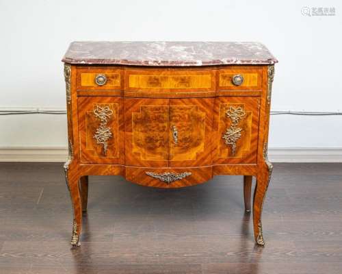 A Louis XV style kingwood and strung commode of serpentine f...