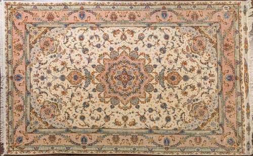 A Tabriz silk and wool, hand knotted carpet, 6 8" x 10 ...