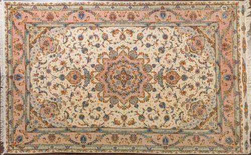 A Tabriz silk and wool, hand knotted carpet, 6 8" x 10 ...