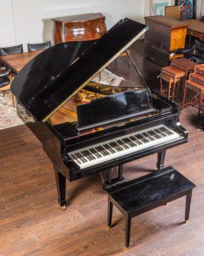 A K. Kawai lacquered baby grand piano and bench