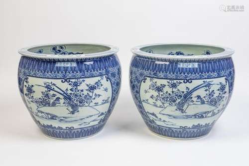 A large pair of Chinese blue and white planters in Ming styl...